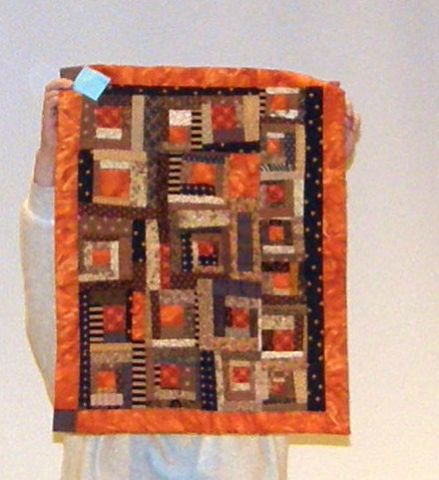 Marilyn Lutzker-Orange Log Cabin