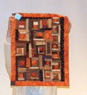 Marilyn Lutzker-Orange Log Cabin