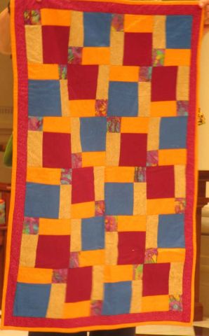 Orange and Red Charity Quilt