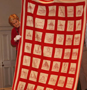 Red and White Quilt with Embroidery