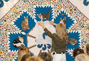 Barbara Barber and her quilt Cats