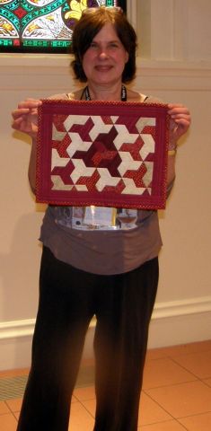 Jane Adler-Marjorie Rice's 90th Birthday Quilt-a small red and white tessellation 