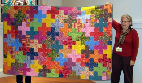Tina Barth-Criss Crossed-Charity coach and chat quilt designed by the group